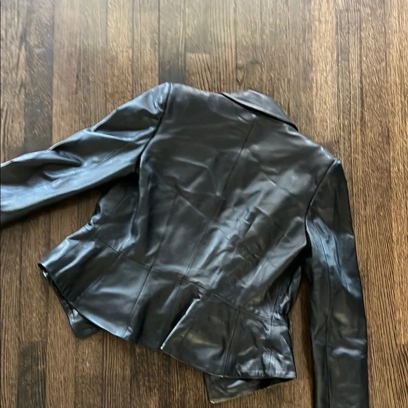 Alexander McQueen Black Leather Jacket like new condition. Never worn.